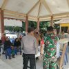 Babinsa Koramil Ngrambe Amankan Penyaluran Bantuan PKH Plus Tahap III